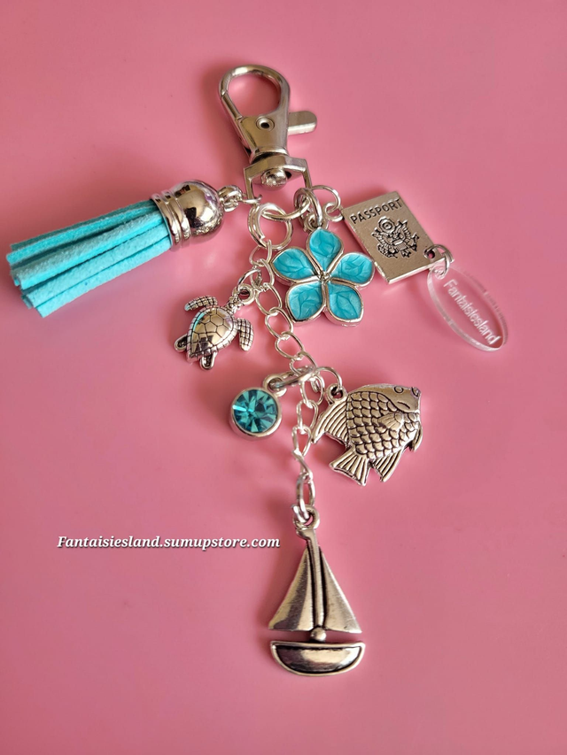 Bijou de sac argenté -  eaux turquoises