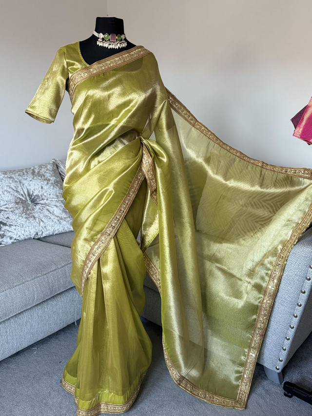 Celebrity-Inspired Green Tissue Saree – Elegance Redefined 