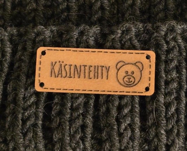 Nahkapaperimerkki käsintehty nallekuviolla