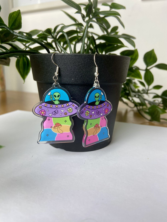 Mushroom abduction earrings.