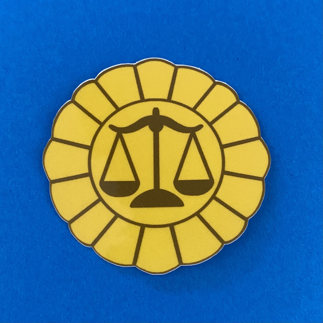 AA: defense attorney badge (laminated sticker)