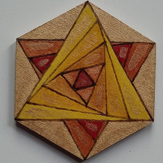 Magnet with geometric star design and colour