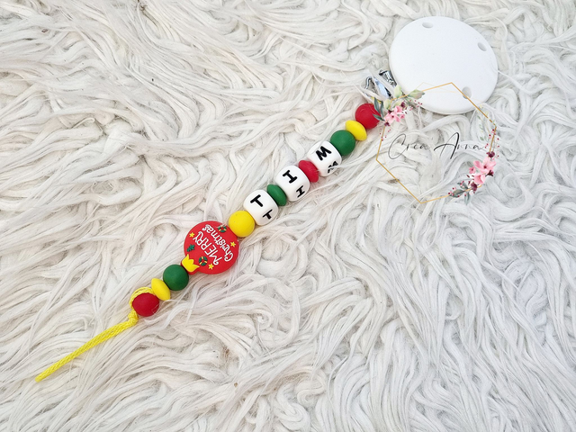 Attache-tétine boule de Noël