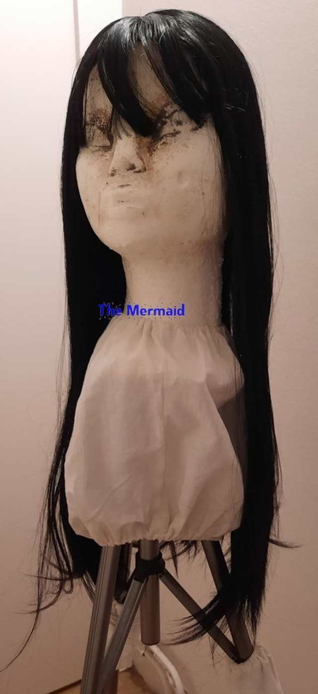 halflange zwarte pruik