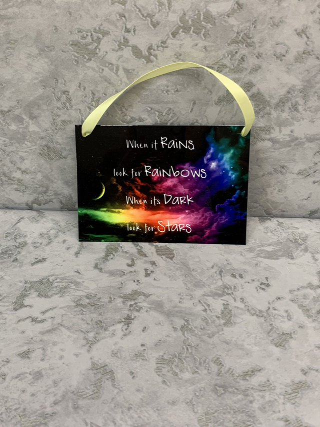 When it rains look for rainbows, when its dark look for stars.