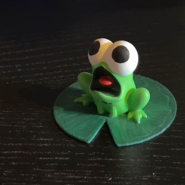 Grenouille paniquée verte