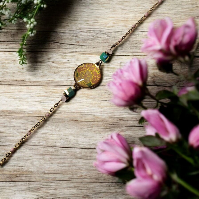 bracelet acier inoxydable motifs japonais rose et turquoise doré