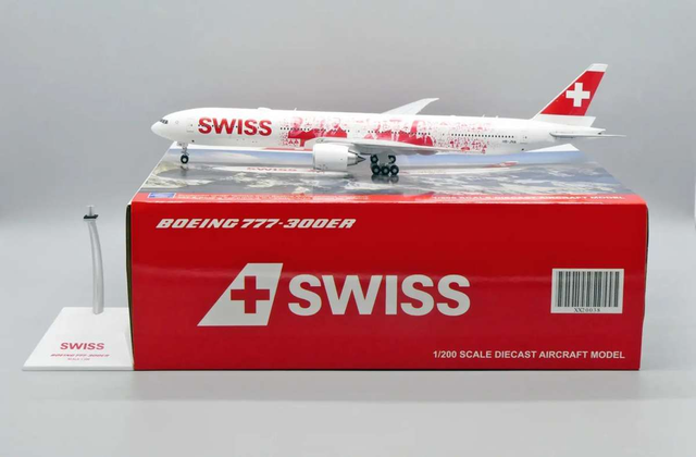 Boeing 777-300ER Swiss "Faces" HB-JNA