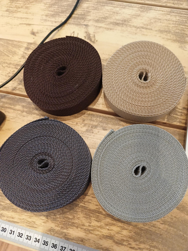 Huismerk: Tassenband