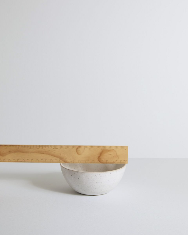 Small white speckled bowl