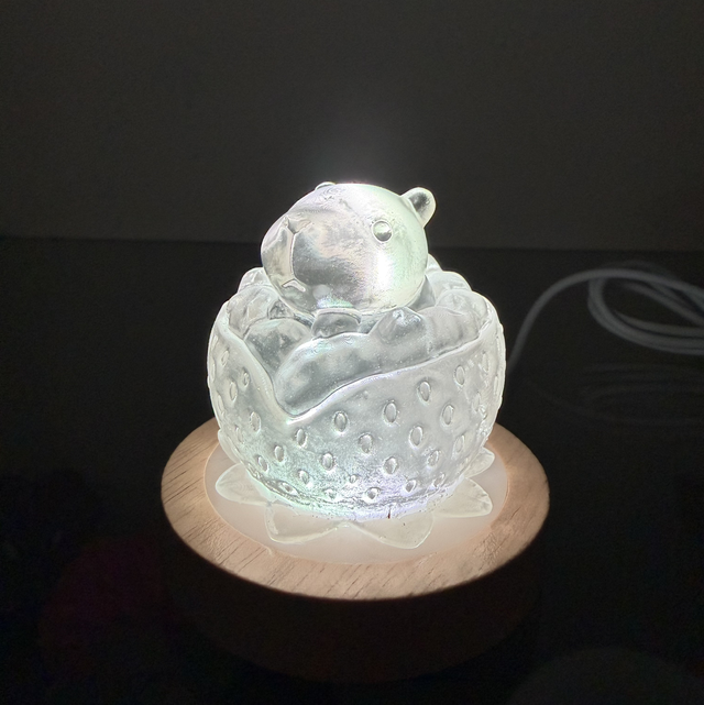 Fanart in resina trasparente con base luminosa