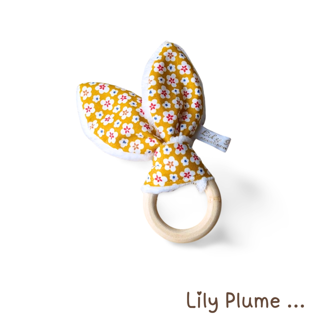 Hochet de dentition jaune moutarde fleuries