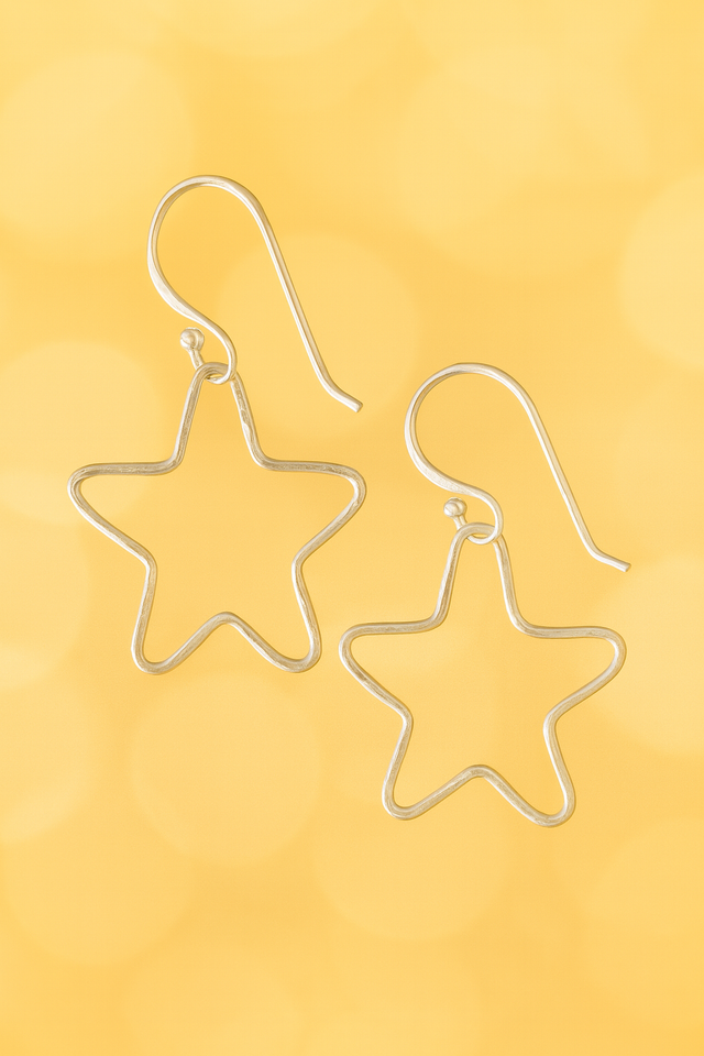 Winter Twinkle: Silver Star Drop Earrings