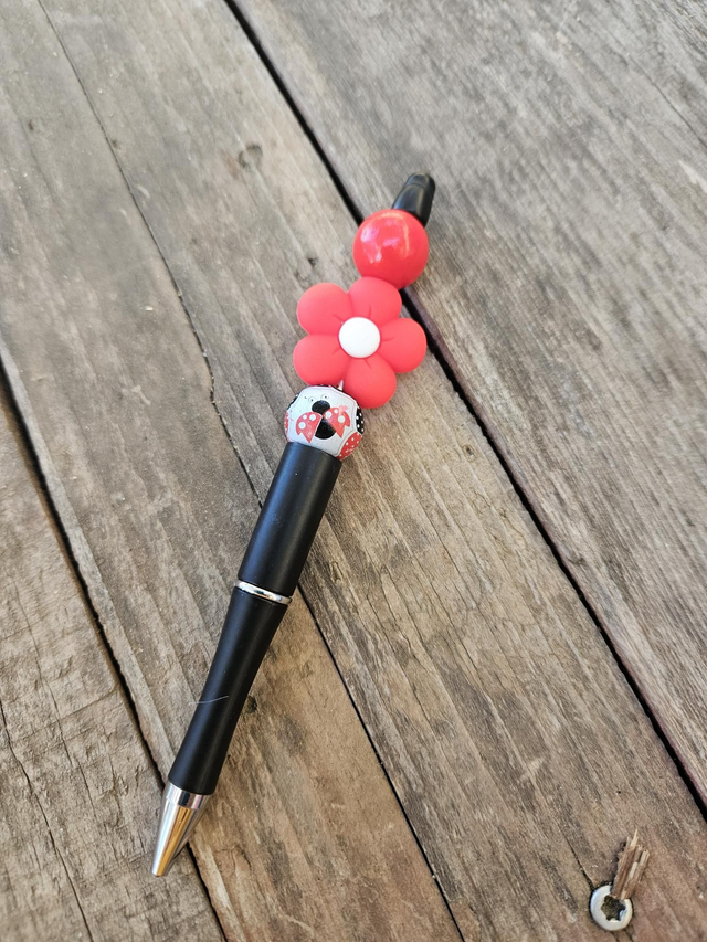 Stylo fleur et coccinelle 