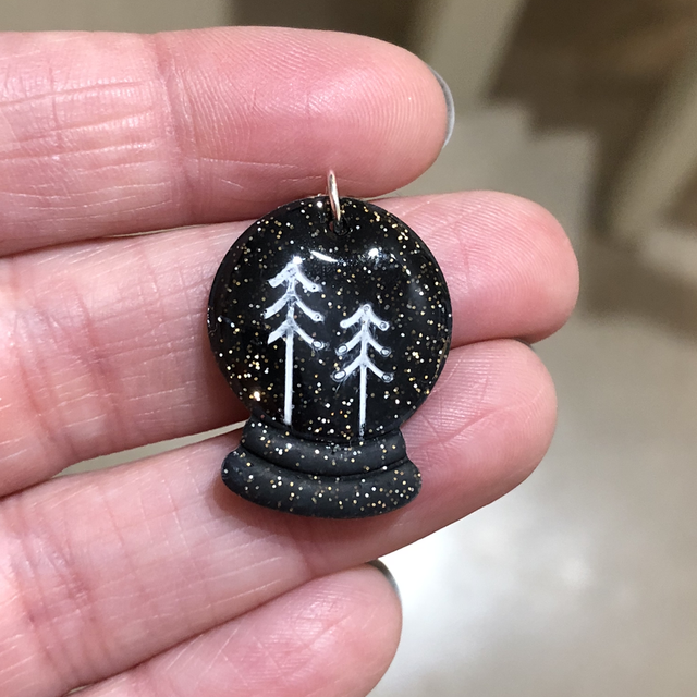 Black sparkle snow globes 