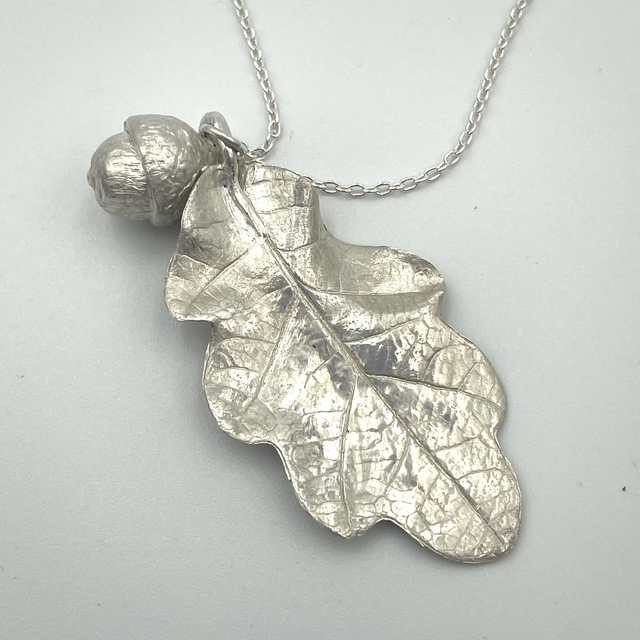 Silver oak leaf and acorn