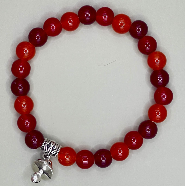 B117 - Bracelet perles en verre tons rouges 