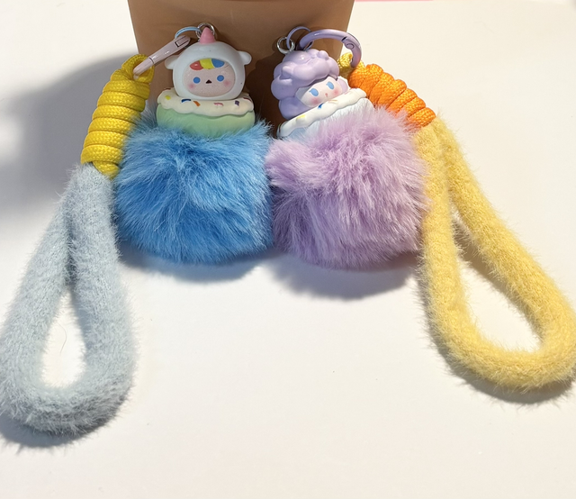 Kawaii themed Doughnut Character Pom Pom keychain 2 designs 