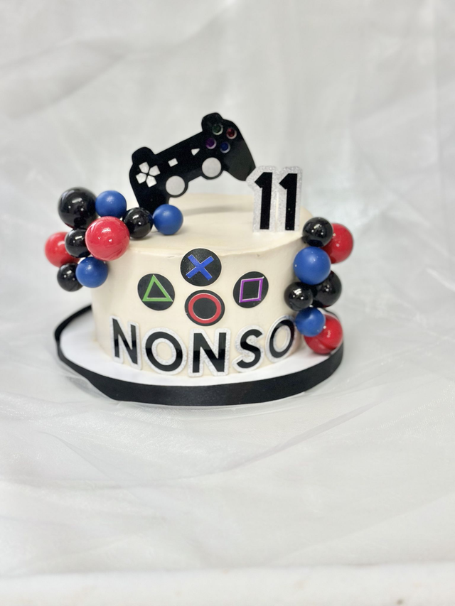 Gaming Birthday cake decorated with gaming theme decorations