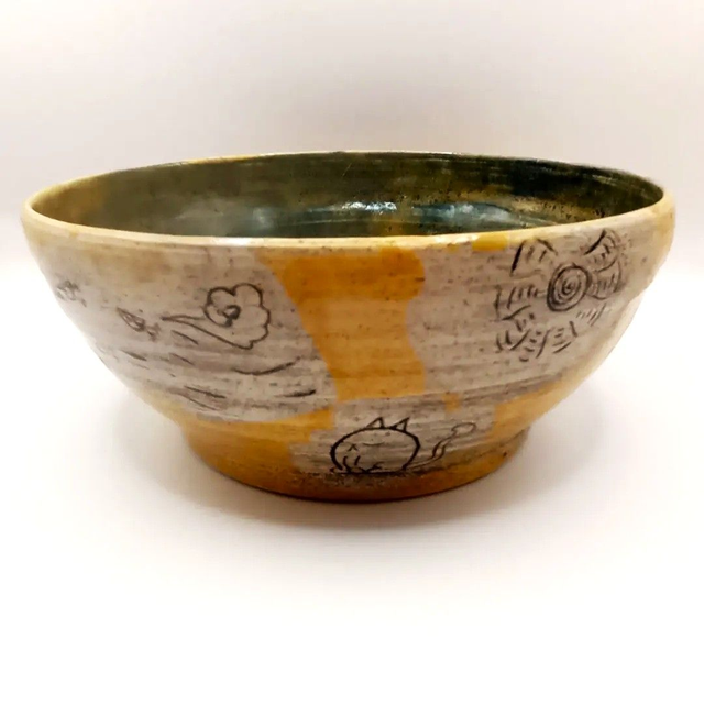 Cats and birds bowl