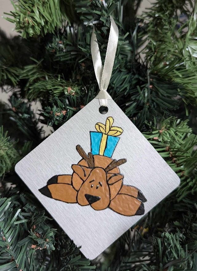 Cerf et son cadeau 2024