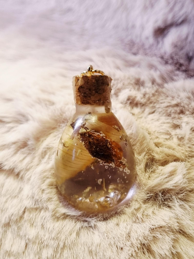 Le Pendentif Potion #57 - Joie