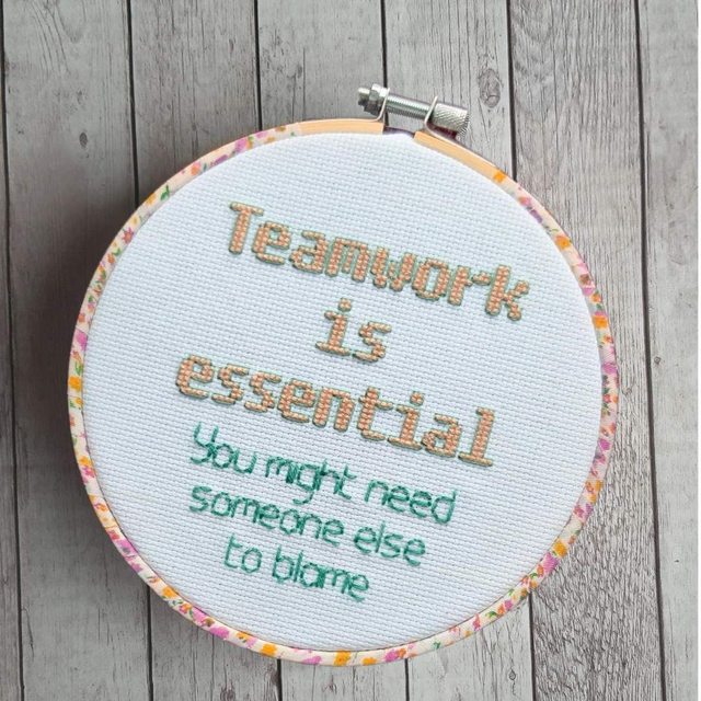 Teamwork is essential, completed cross stitch