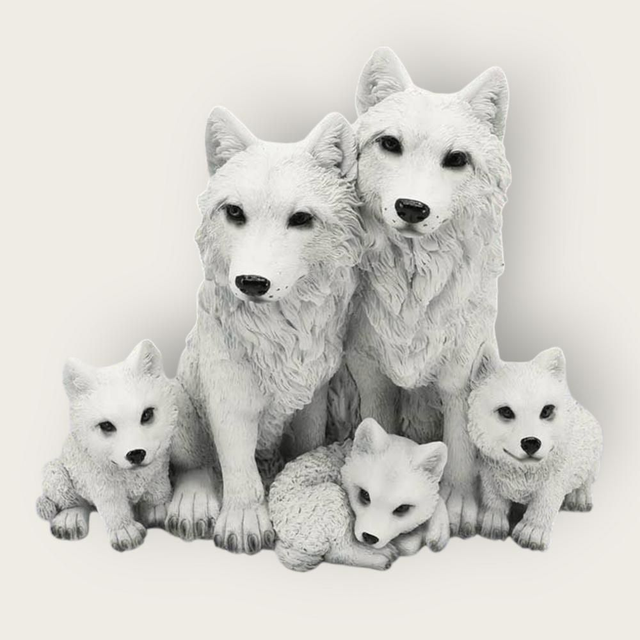 Famille de loups blancs assis