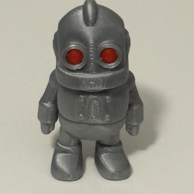 3D Printed Robot With Red Eyes