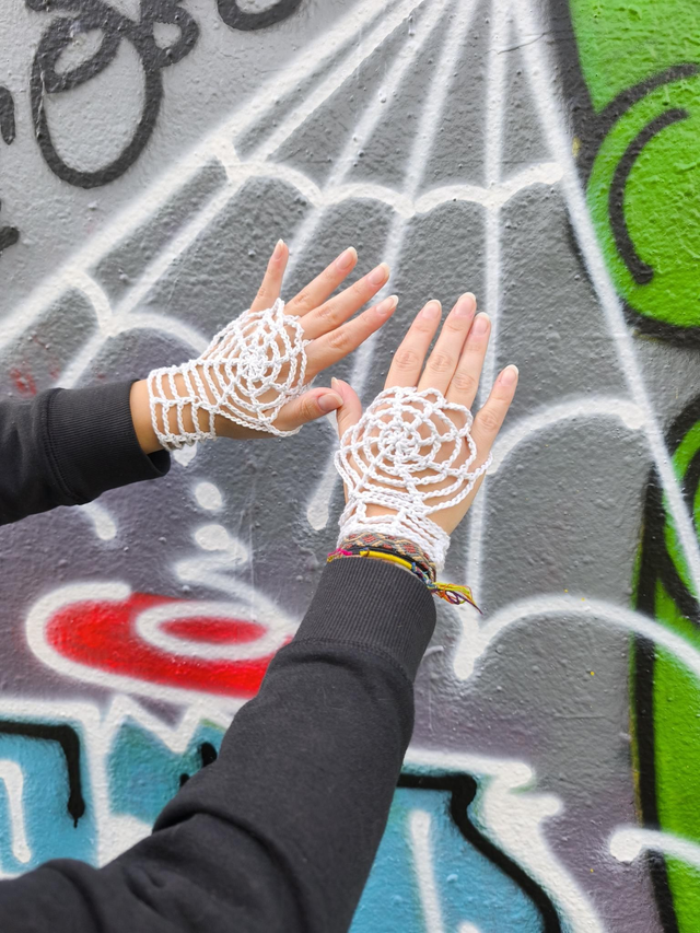 Mitaines phosphorescentes toile d'araignée