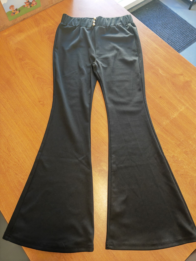 Pantalon noir en 9 ans