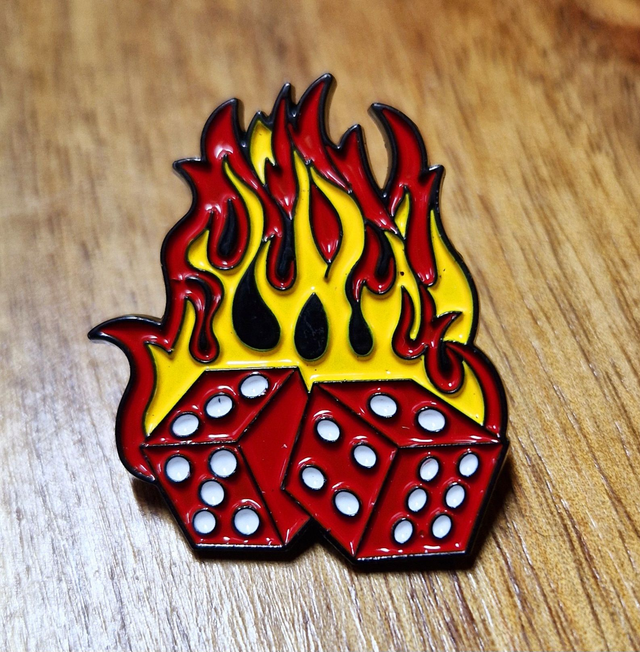 PIN&#039;S JEUX FLAMME