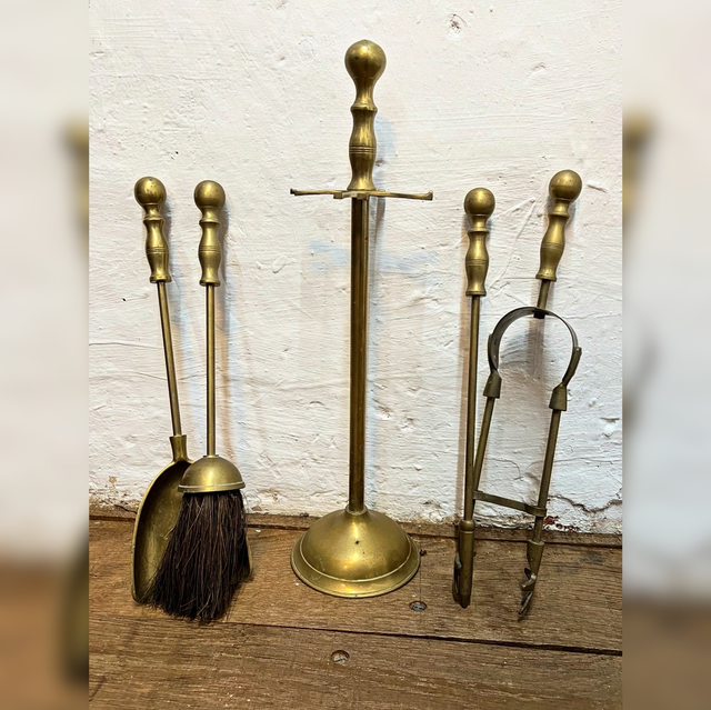 A Mid 20th Century Brass Fireside Companion Set