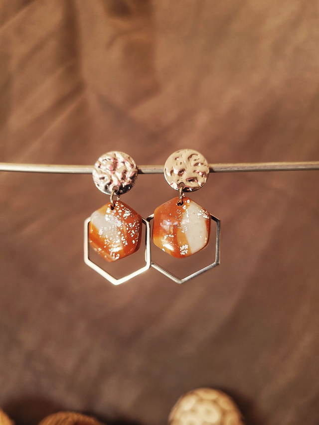 Argile, résine et argenté