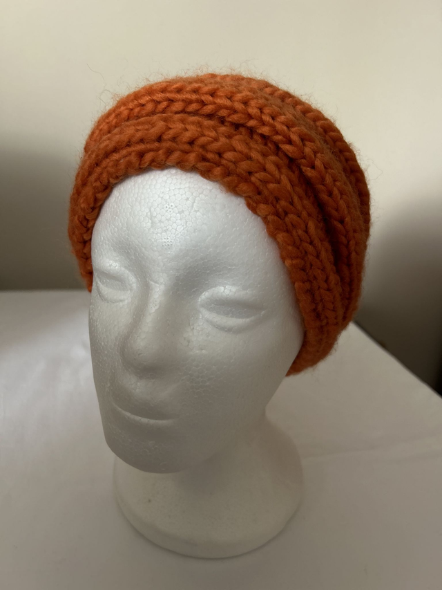 7052  ladies knitted ear warmers, orange