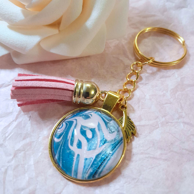 MURMURE NACRE - Porte-clés - Plume dorée