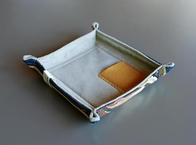 Vaciabolsillos con bolsillo