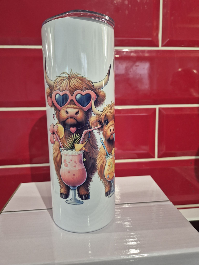 3 cute highland cows with cocktails