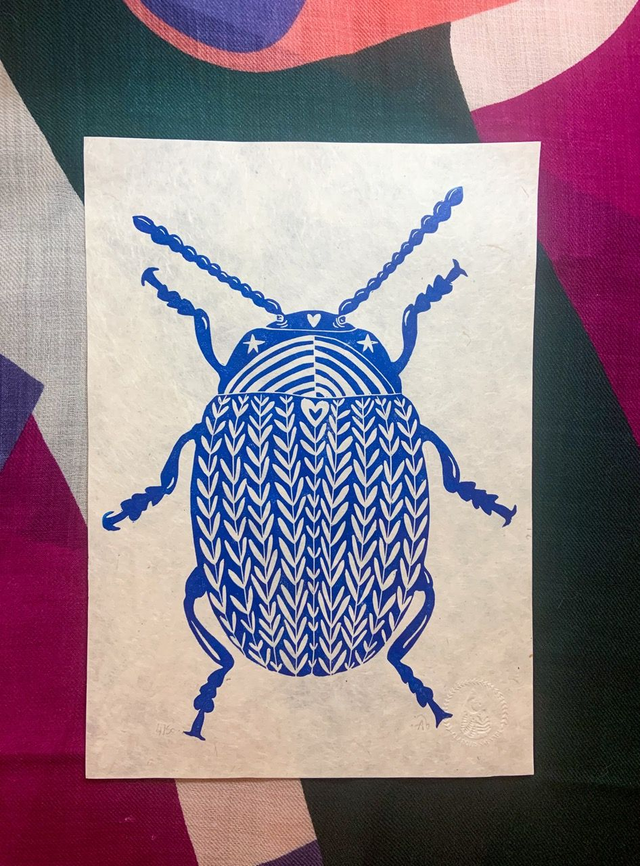 Chrysolina fleurie : le scarabée arc-en-ciel