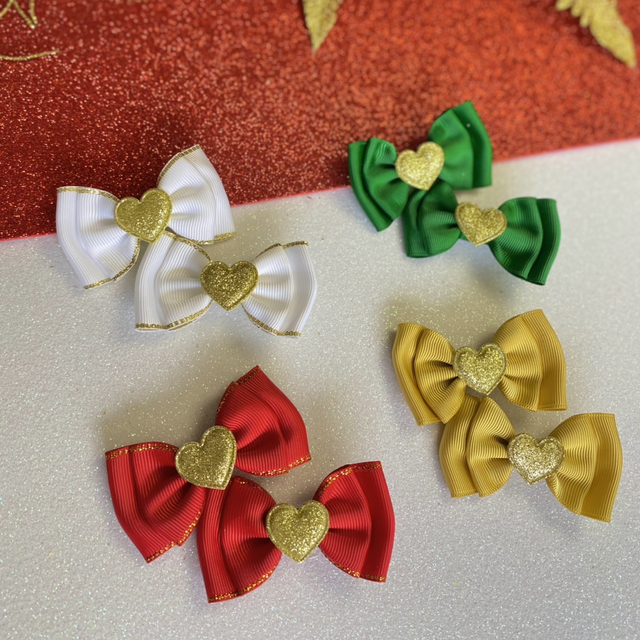 Paire de petites barrettes à cœurs pailletées