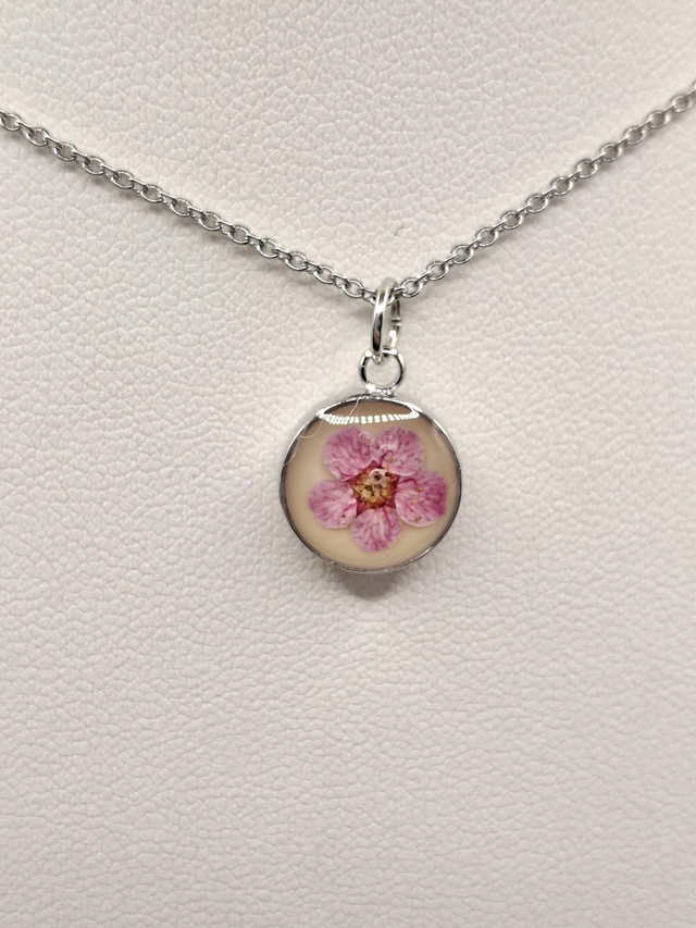 Small pink and yellow flower pendant