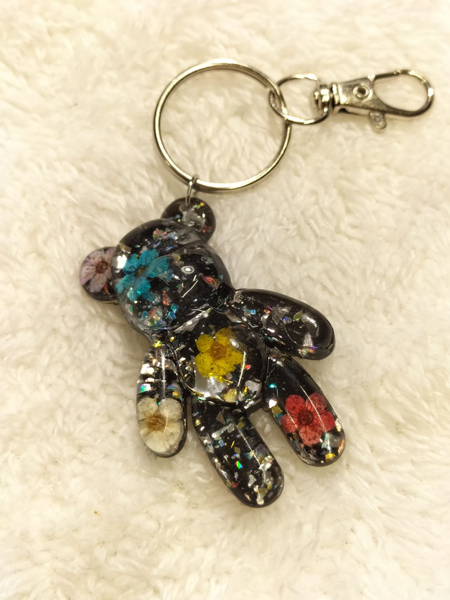 Porte-clés ourson fleuri noir pailletté