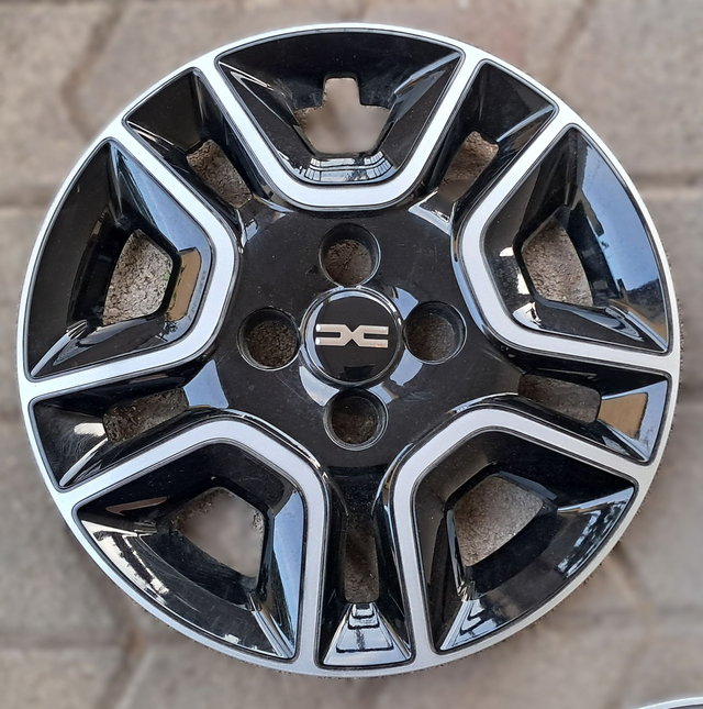 Enjoliveur Dacia Spring 14p Occasion 