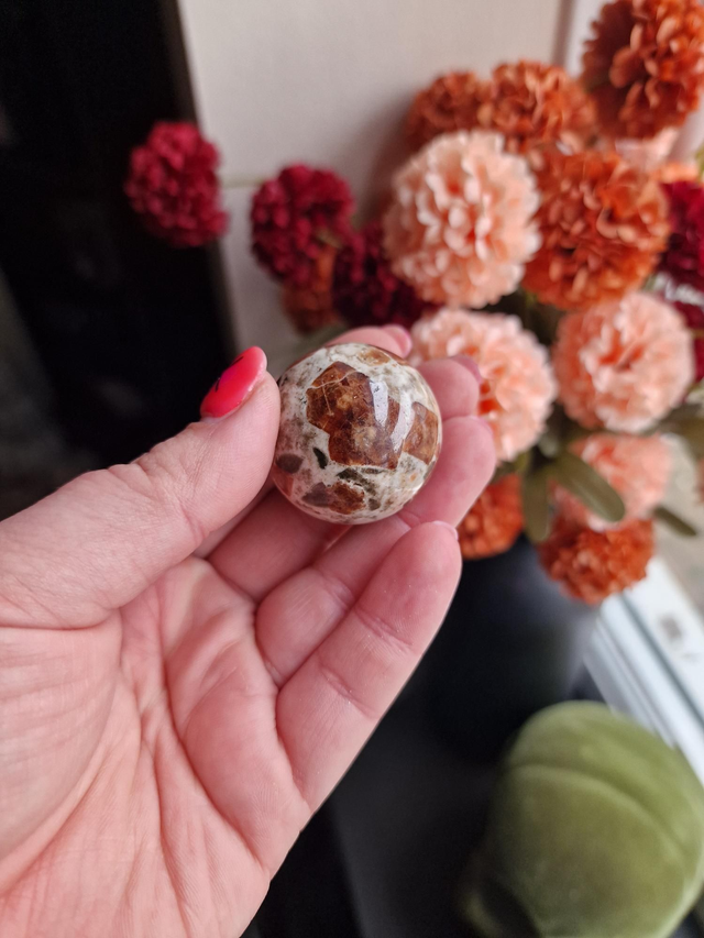 Garnet in limestone sphere 