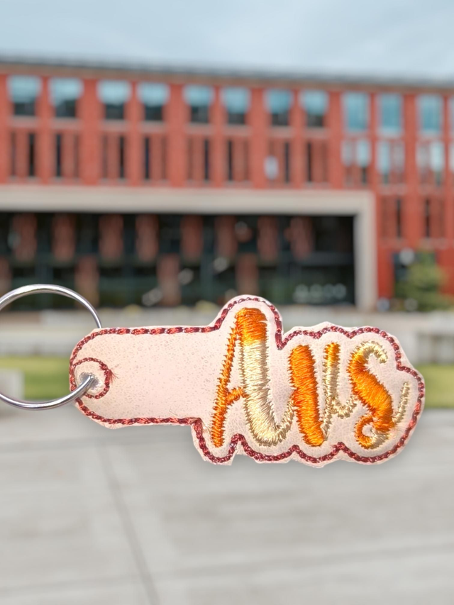 Porte clef avs orangé