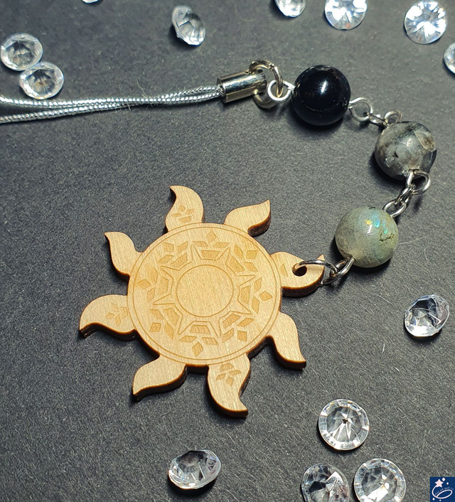 Bijou de téléphone soleil - labradorite, labradorite noire et onyx