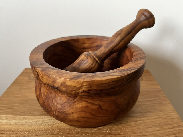 Solid olive wood mortar and pestle.