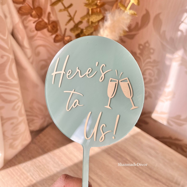 ‘Here’s to Us’ Acrylic Cake Topper