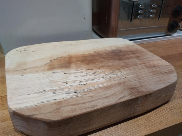 Charcuterie board - approx 35cm X 30cm at the widest points.
