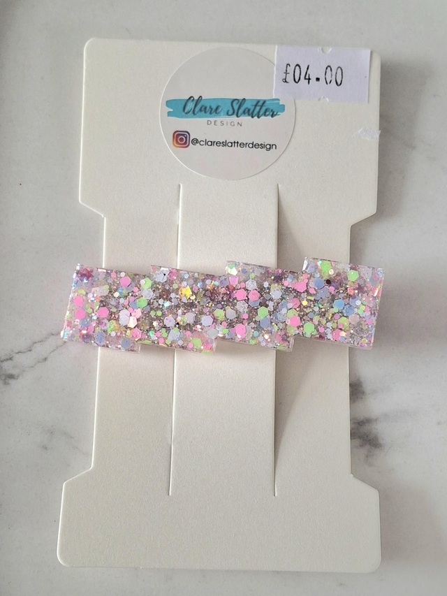 Pink, blue and green zig zag clip